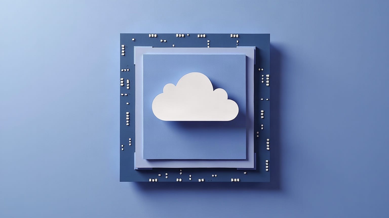 A layered paper chip square with a small white cloud shape resting on top of it
