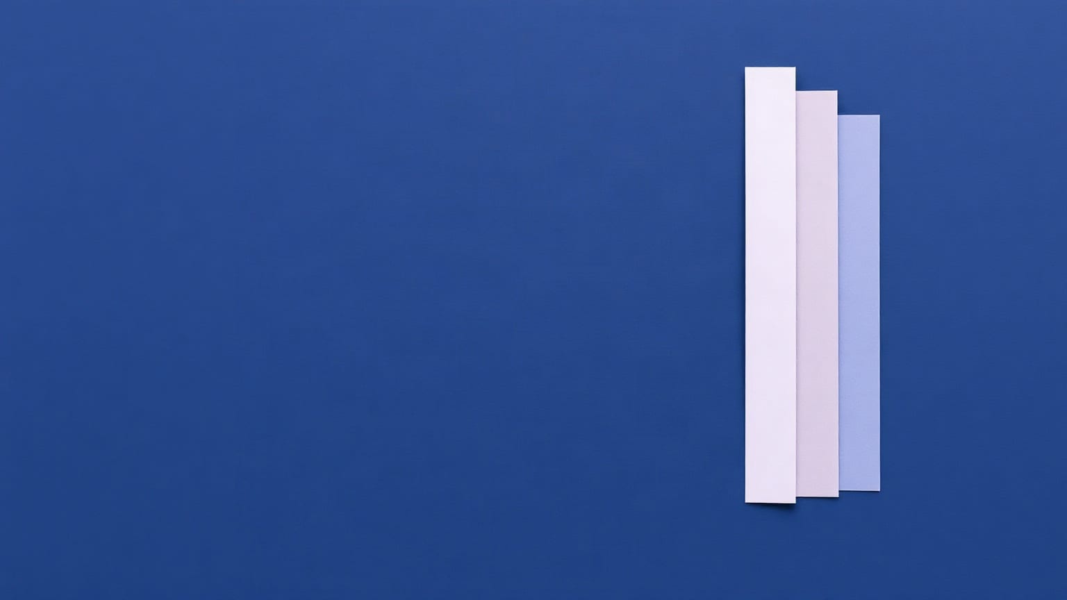 Cut-paper illustration: a vertical column of stacked horizontal bars of varying length.
